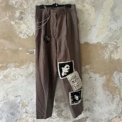 Pantalon con parches