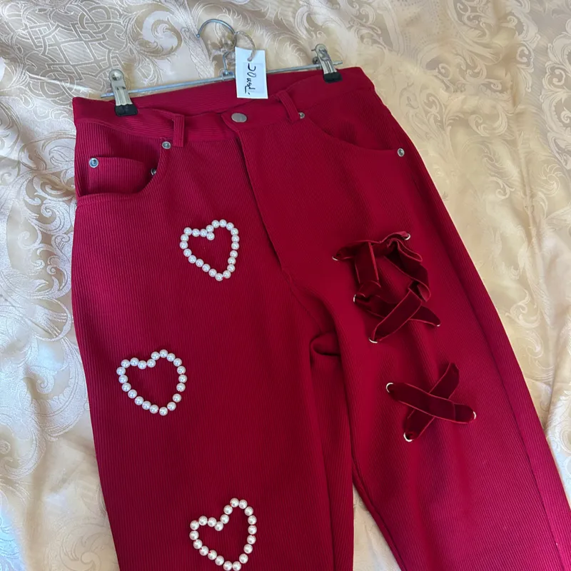 Pantalon con perlas y cinta