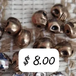 Calaveras metálicas color bronce