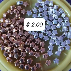 Estrellitas plantimetal plateadas o doradas