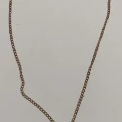 Collar de corazón con pájaro 