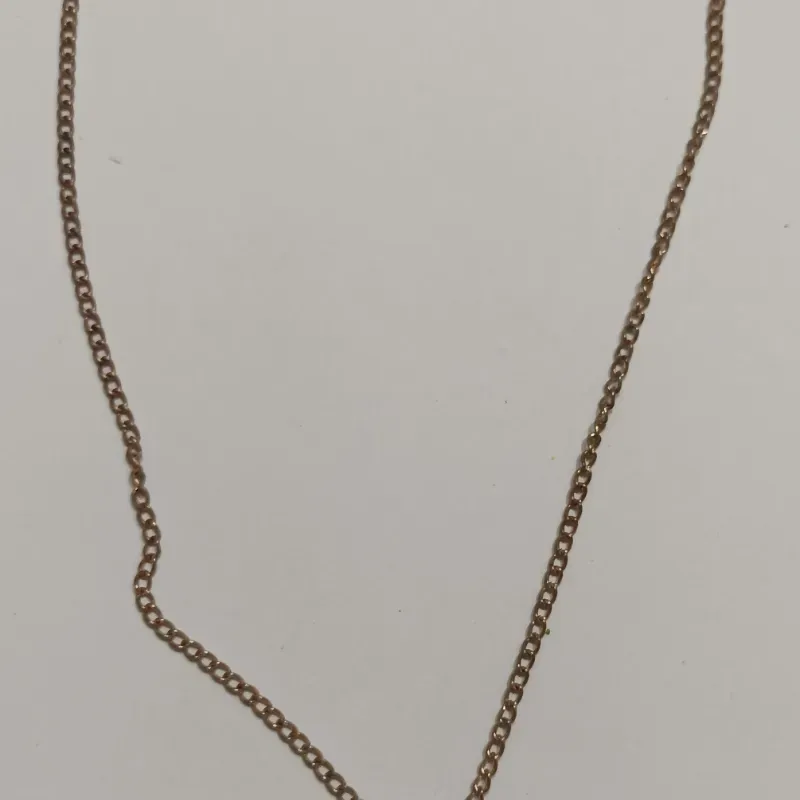 Collar de corazón con pájaro 