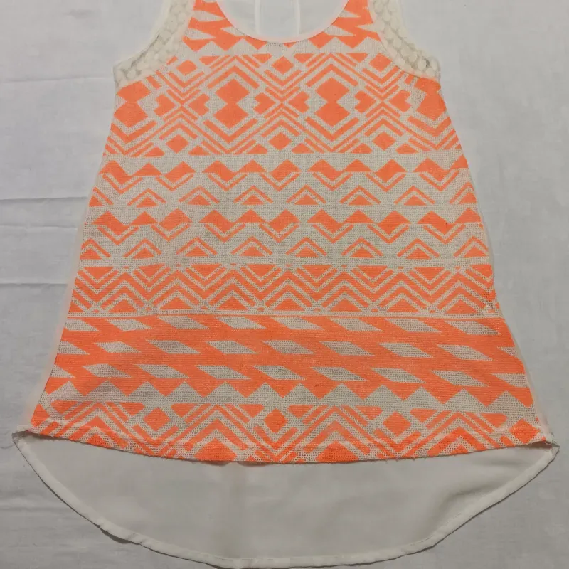 Blusa de estampado naranja y blanco