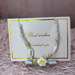 Collar verano flor amarilla y caracoles 