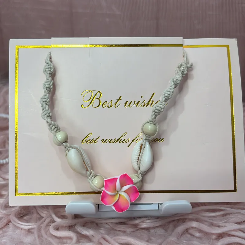 Pulsera verano flor rosa y caracoles 