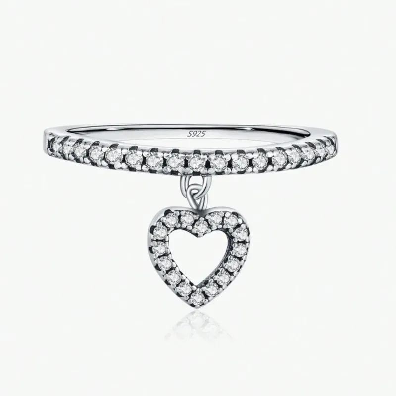 Anillo con colgante de corazón oscilante