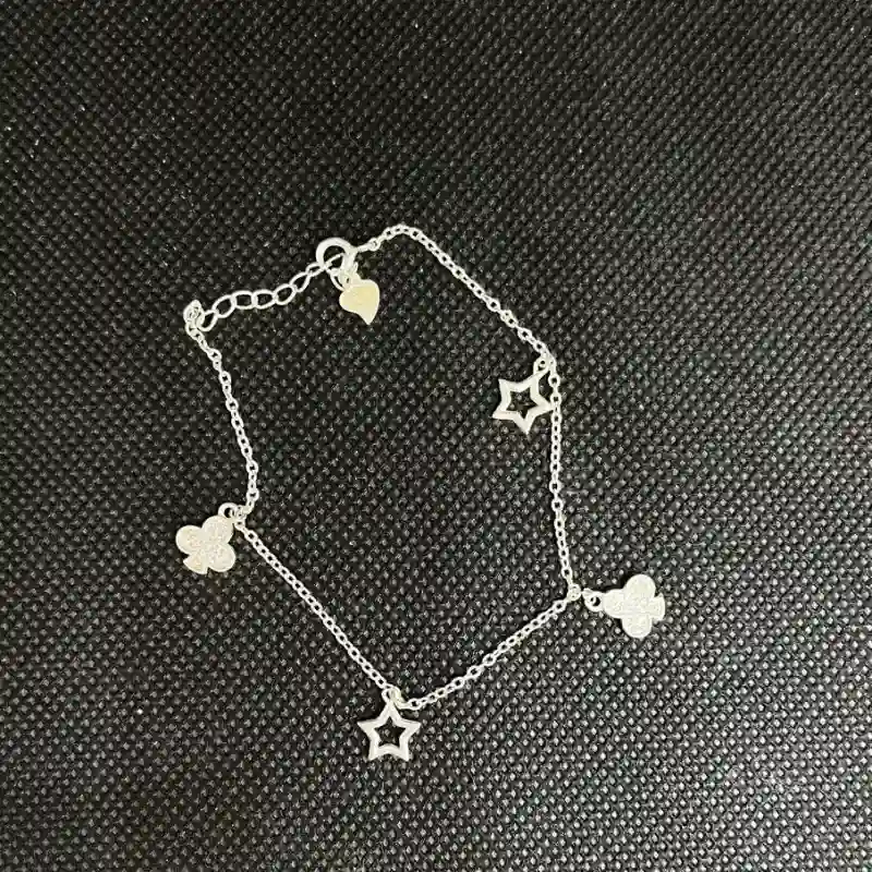 Manilla de la suerte con colgante de estrellas y trébol