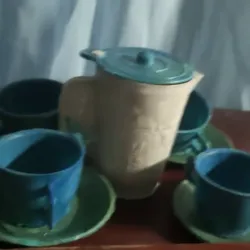 Juego de jarra con 4 tazas 