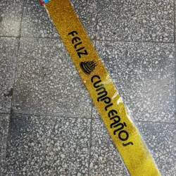 Banda feliz cumpleaños dorada escarchada 