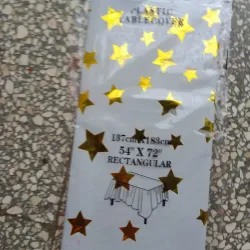 Mantel blanco con estrellas doradas cromado