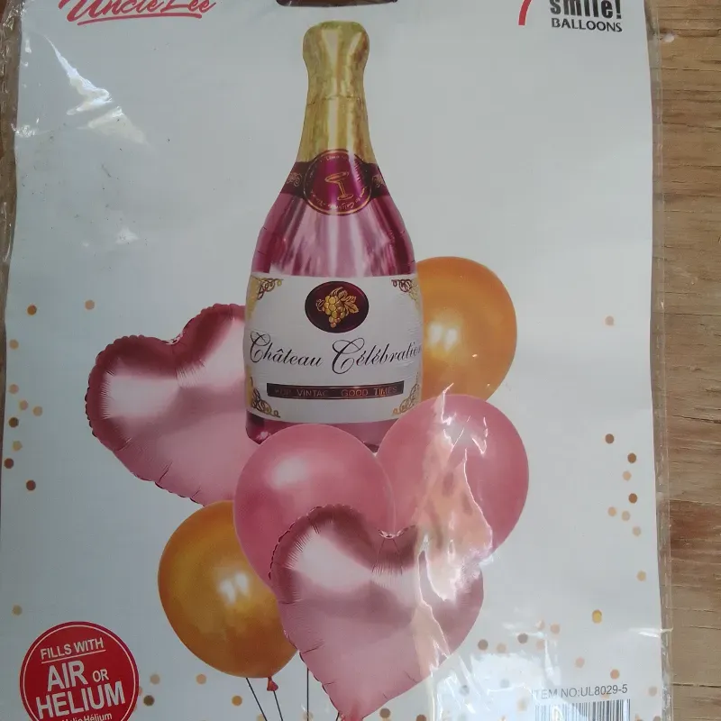 Set de globos botella rosa oro