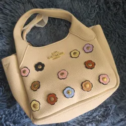 Cartera Coach