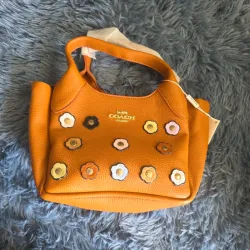 Cartera Coach