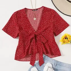 Blusa roja de bolas 