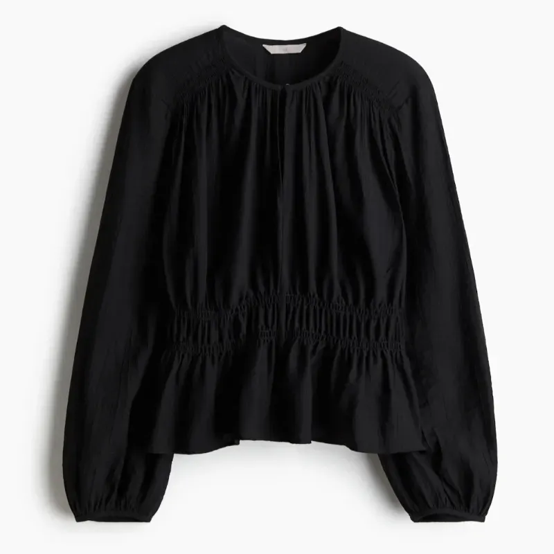 Blusa con detalle de fruncido/H&M 