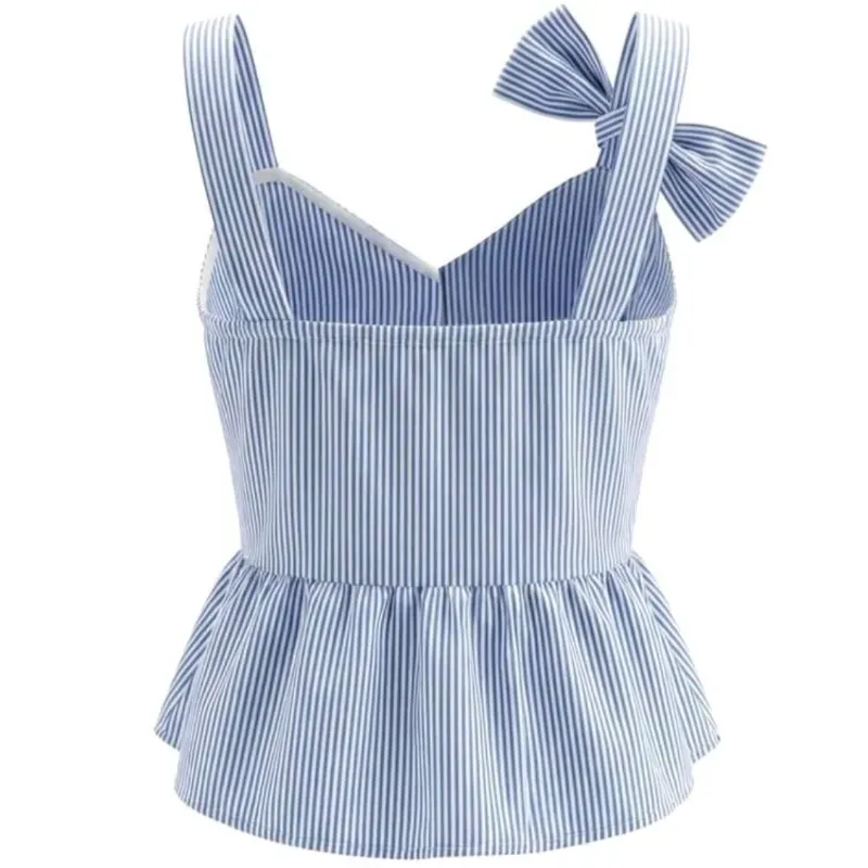 Blusa con volantes y lazo