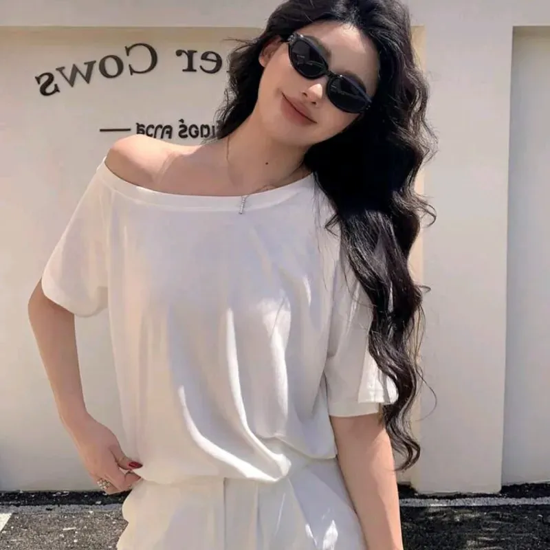 Conjunto top halter cuello asimétrico/pantalón