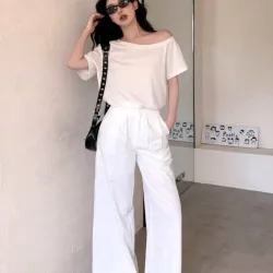 Conjunto top halter cuello asimétrico/pantalón