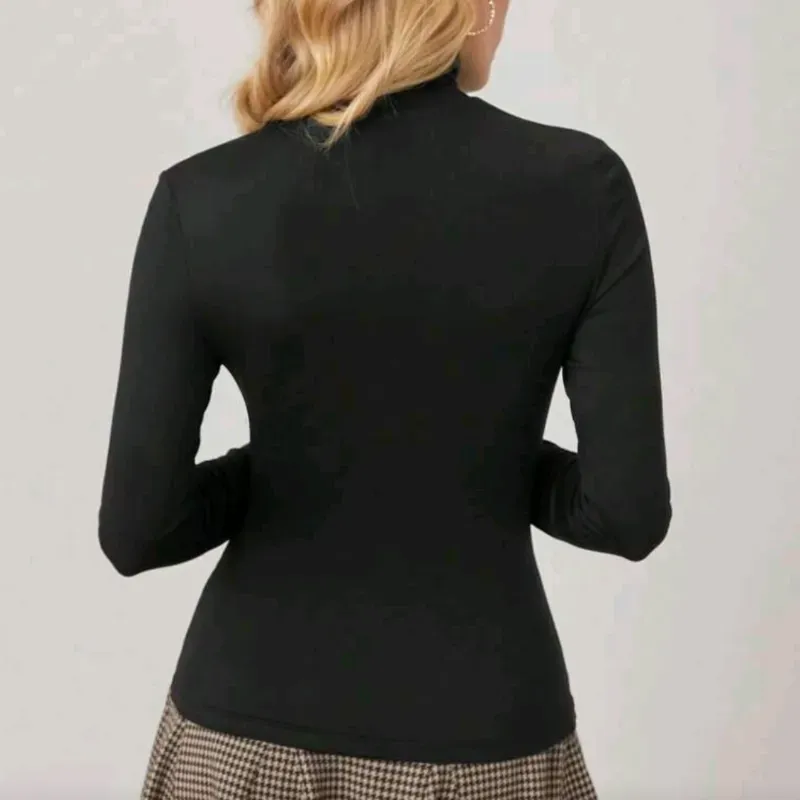 MUSERA Blusa de cuello alto/Negro