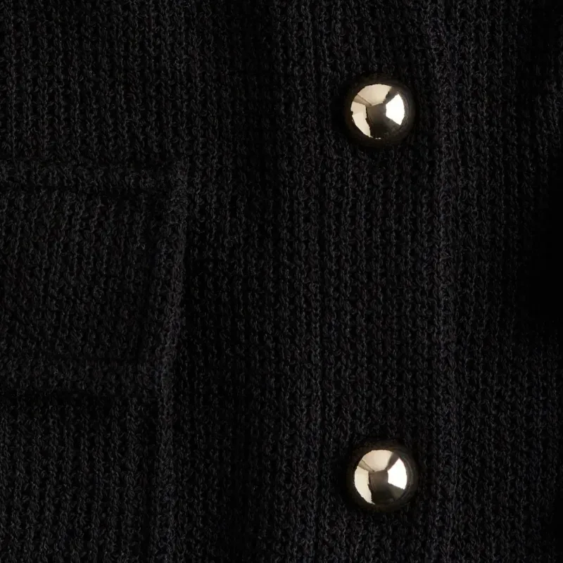 Top corto en punto gofrado/H&M