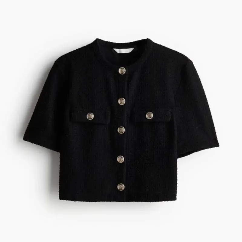 Top corto en punto gofrado/H&M