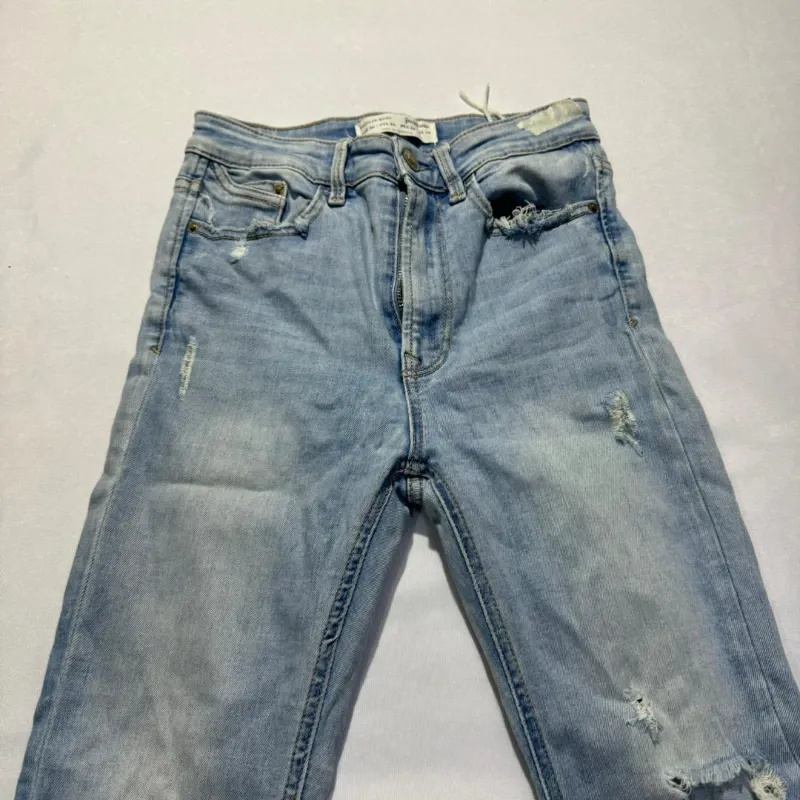 Jean Skinny Ajustado Con Rotos Strad