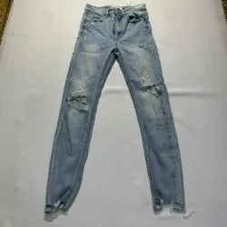 Jean Skinny Ajustado Con Rotos Strad