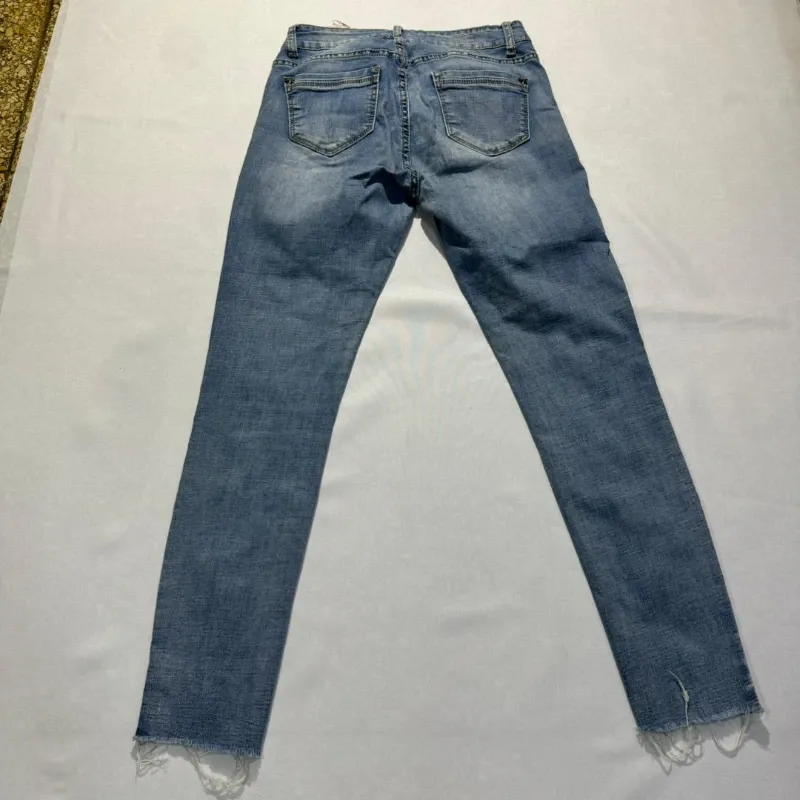 Jean Skinny Mezclilla Oscura con Rotos