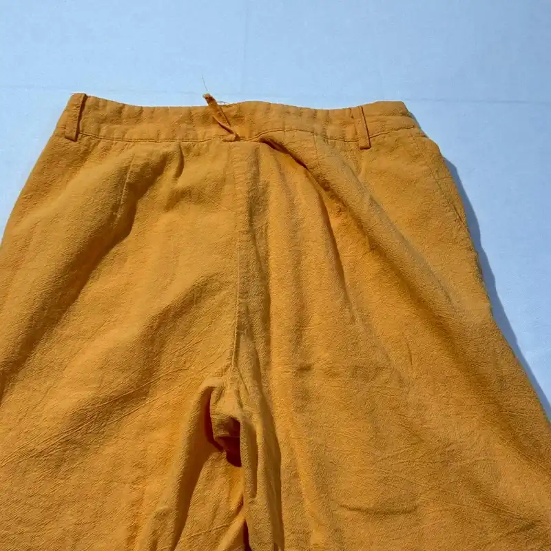Pantaloneta Naranja con Boton Carmelita