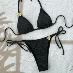 Bikini negro con brillos y detalles dorados