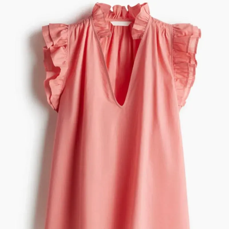 Blusa con ribete de volantes 