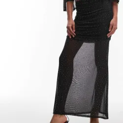 FALDA NEGRA CON DETALLES TERMOSELLADOS DE MALIA TRANSPARENTE