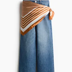 Jean vaquero con cinta satinada diseño naranja a la cintura