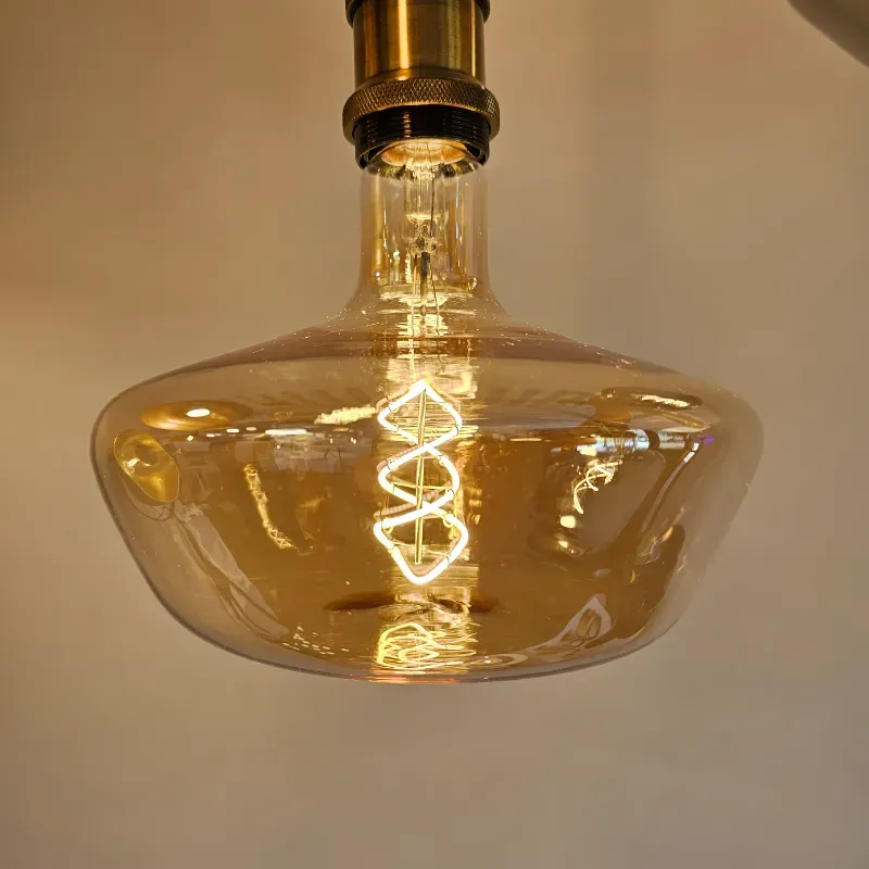 Bombillo decorativo plano dorado