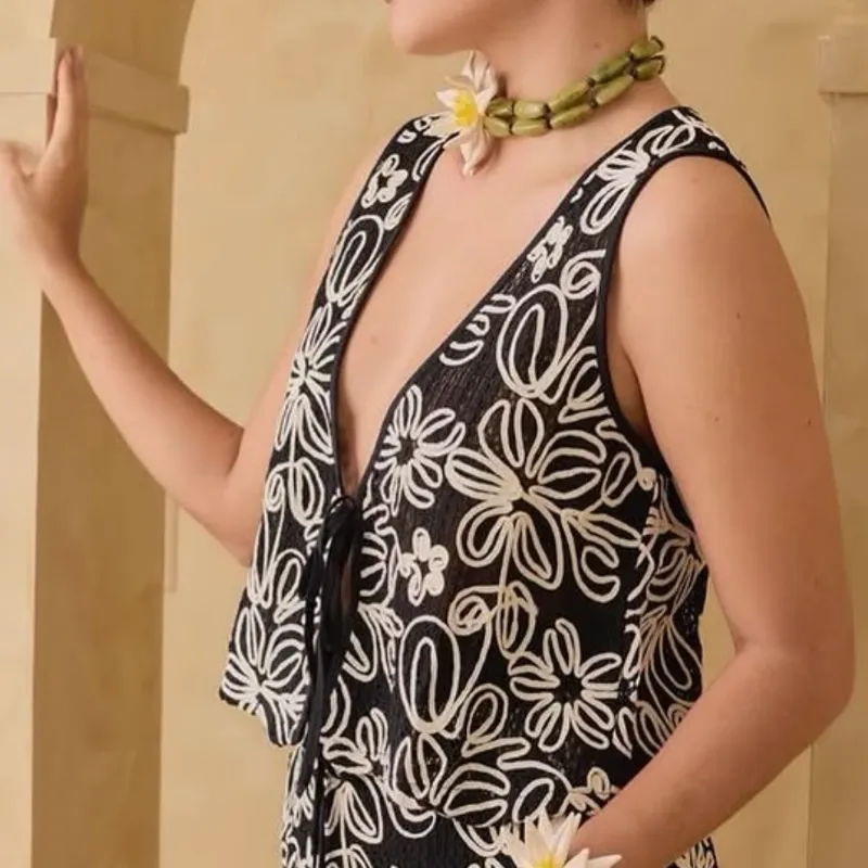 Blusa tejida  con lazo 