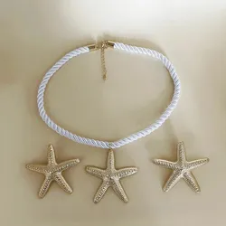 Collar + pendientes de estrella 