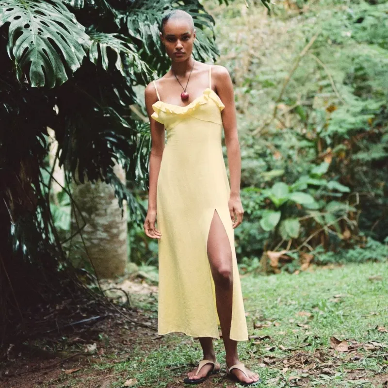 Vestido midi con abertura lateral Zara