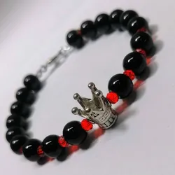 Pulsera de ónix negro con corona