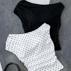 Blusas elegantes , negra y de lunares en tendencia