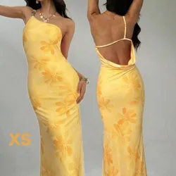 Vestido de verano amarillo con flores y espalda descubierta