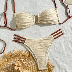 Bikini beige con tiras a los lados