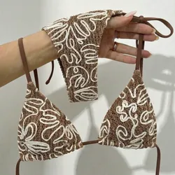 Bikini beige oscuro con detalles en blanco
