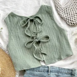 Top verde con lazos delante