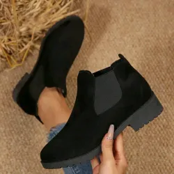 Botas negras hasta el tobillo