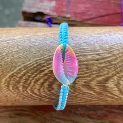Pulsera tejida+caracol