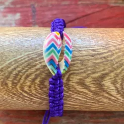 Pulsera tejida+caracol