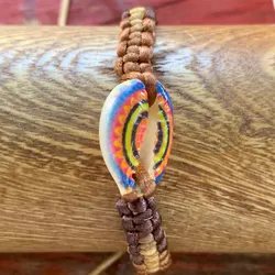 Pulsera tejida+caracol