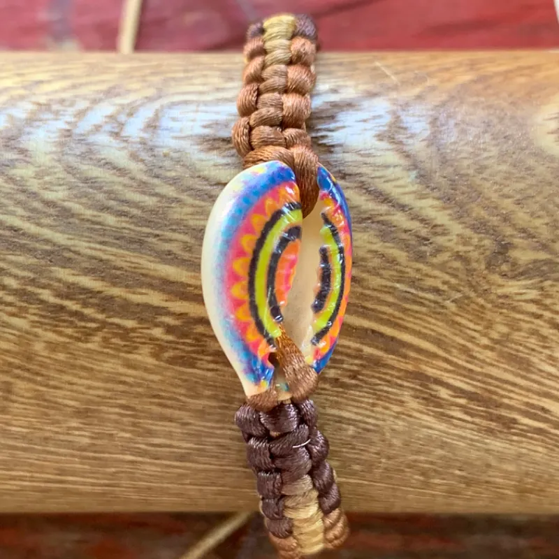 Pulsera tejida+caracol