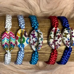 Pulsera tejida+caracol
