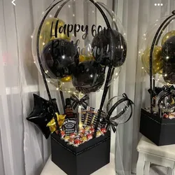 Caja sorpresa , incluye una botellita de Ron
